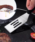 Amazon two-piece stainless steel kitchen spatula set, front view with slotted blades.