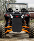 Heavy Duty UTV Trash Sack Durable PVC Mesh Garbage Bag For Trailside Cleanup attached to Polaris RZR, showcasing utility and size.