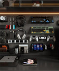 Organized desk with gaming controllers and accessories on a pegboard using 10-Pack Heavy Duty Pegboard Hooks For Power Tools And Garage Organization For DIYers Vinyl-Coated Steel Drill Holders And Utility Hangers 20 Lb Per Hook Fits Standard One Quarter Inch Pegboards Black.