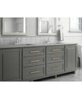 Gray bathroom vanity with Napier Cabinet Knob Set In Champagne Bronze For Slick Kitchen And Bath Upgrade, 8-13/16 Inch Center-To-Center Drawer Knobs installed