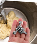 Replacement Bread Machine Paddle Blade For Effortless Dough Mixing At Home shown in hand with dough