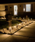 12 Pack Low Voltage Path Lights 3W LED Landscape Lighting For Outdoor Driveways And Gardens Aluminum Black glowing at night