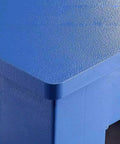 Top view of Rock Solid Heavy Duty Steel Workbench featuring sturdy powder coated blue surface and rounded edges.
