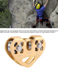 Heavy Duty Zipline Dual Trolley With 30KN Breaking Strength in aluminum alloy, stainless steel bearings, with rock climber in background