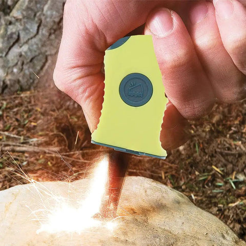 Person using Sparkie Firestarter With Built In Carbide Striker And Spring Loaded Flint Bar For Backpacking Hunting Camping Emergencies