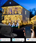 Outdoor Weatherproof Smart Plug 2 Pack Featuring Rock Solid 2.4ghz Wifi And Frictionless Alexa Google Assistant Voice Sync For A No Sweat Patio Automation Setup with holiday lights in background.