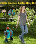 Mobile Garden Hose Reel With Smooth Rolling Wheels And Foldable Handle Heavy Duty Water Hose Cart being wheeled on grass.