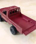 RC Beast Rock Crawler Truck 4x4 Toyota LC79 One Twelfth Scale Off Road Pickup rear view with open tailgate