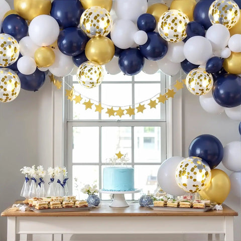 Bold Navy Blue Gold Confetti Balloons Set 50 Pack 12 Inch Latex Balloons With Ribbon in a party setting above a dessert table.