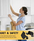 Fifty Pack Universal Cabinet Hinge Restrictor Clips Stop Annoying Door Slams With Totally Effortless Slide On Soft Close Compatibility For Kitchens And Bathrooms Full Control Over Swing Angles Built Tough in use, showing a woman accessing a kitchen cabinet.