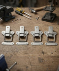 Bombproof Heavy Duty Toggle Draw Latch Set For Cabinets Boxes Trunks And Guitar Gear 4 Pack 304 Stainless Steel on workbench