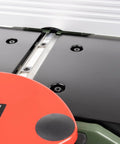 Close-up view of the 8 Inch Benchtop Jointer With Spiral Cutterhead And Teflon Coated Aluminum Tables, showcasing the flat table and adjustment screws.