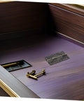 Close-up of Vintage Iron Jewelry Box Hinges with screws on a wooden surface, ideal for DIY chest restoration.
