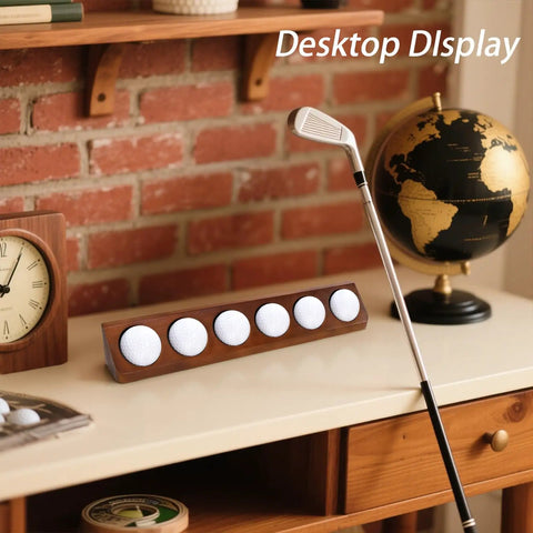 Solid Wood Golf Ball Display Case With Walnut Finish, Wall Mount Or Desktop Holder For Six Balls on desk with globe and clock