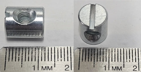 12 Pack Cross Dowels Barrel Nuts 12mm By 10mm Zinc Plated 10-24 Thread CNC Steel Hardware For Furniture Cabinets DIY Projects And Home Renovations Beefy Heavy Duty Joints showing close-up with ruler scale for size comparison.