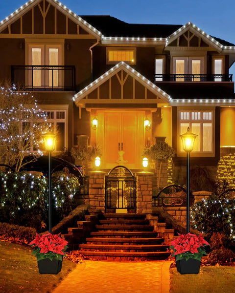 64 Inch Solar Lamp Post Light With Planter illuminating a house entrance, warm white glow, no wiring required, outdoor decor.