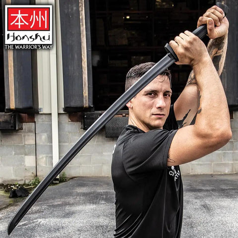 Person holding Realistic Practice Katana Sword For Martial Arts Training Real Deal Feel Dope Bokken Style, textured handle.