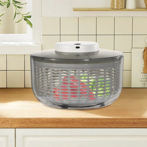 Game Changing Hella Big Electric Salad Spinner For Quick Lettuce Washing Knockout Battery Powered Produce Dryer on kitchen counter.