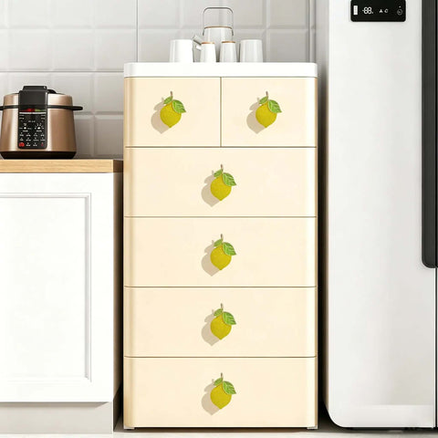 Gotta Grab These Sick Solid Zinc Lemon Drawer Knobs Fresh Citrus Cabinet Handles on a dresser in a kitchen.