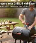 Man installing Lid Clamp Replacement For Longhorn And Highland Smokers, 1 Pack, Durable BBQ Accessory on a black grill