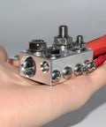 12 Way Battery Terminal Block And Bus Bar With Multi Size Connectors For Lithium Or Lead Acid Banks featuring 2 0 AWG connectors in hand.