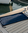 Keep Your Boat Spotless At The Dock With This Inflatable Fender Velvet Hull Protector on a dock.