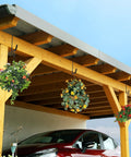 Wooden carport with Heavy Duty Rafter Hook Set With Non Slip Coating holding hanging plants, showing usage for garage organization.