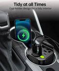 Car Power Inverter Converts DC 12V To 110V AC With Cup Holder Mount For Straight Plug And Play Quick Charging Of Laptops Phones And Tablets Without Any Extra Fuss On Your Next Road Trip in a vehicle cup holder with a smartphone charging.