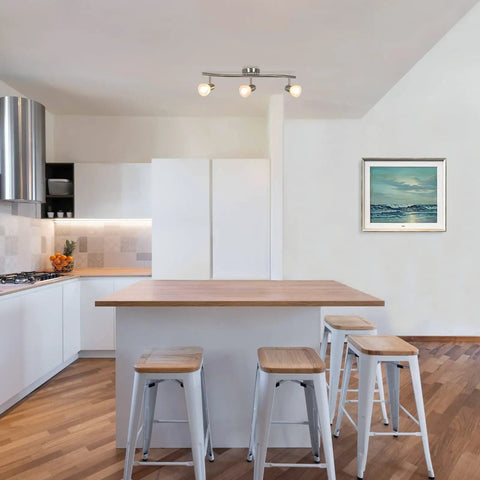 Three Light Kitchen Track Lighting With Modern S Shaped Ceiling Track Bar In Brushed Nickel Finish Lit in sleek kitchen setting