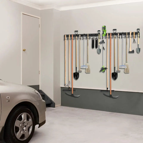 Heavy Duty Metal Garage Tool Organizer Wall Mount Kit Four Pack With Extension Cord Straps holding tools on wall