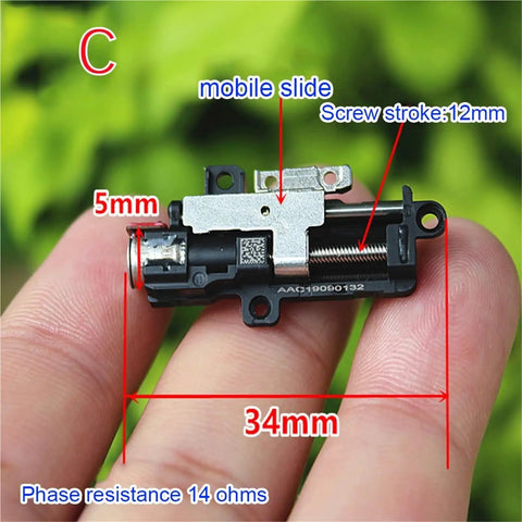 Mini 5mm Travel Stepper Motor Featuring Metal Gearbox And Four Wire Setup For Snappy Linear Actuator Control, 5mm size, metal, shown in hand.