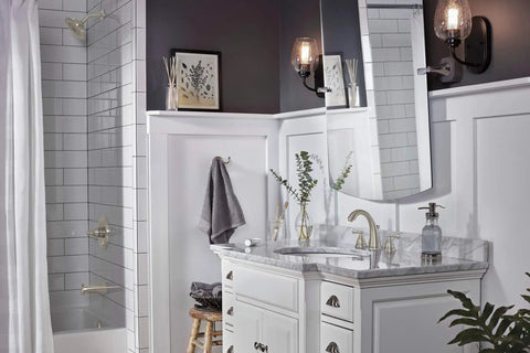 Bathroom with Elmhurst Two-Handle Widespread Bath Faucet in brushed nickel, 3-hole 6-16 inch install, modern look under mirror.