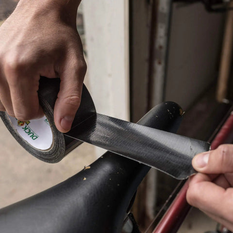 Applying Max Strength Duct Tape Heavy Duty All Weather Waterproof Bond One Roll 1.88 Inch By 35 Yards Black Tough As Nails Tape