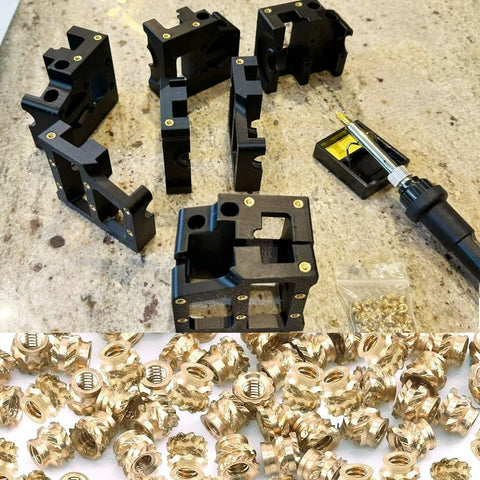 Heat Set Insert Kit with 60W soldering iron and 380 brass inserts arranged on table, ideal for 3D printing applications.