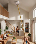 Smoke Detector Disassembly Pole With Rock Solid Anti Pinch Head And Killer Reach For High Ceilings Fire Alarm Maintenance Tool in use, reaching high ceiling