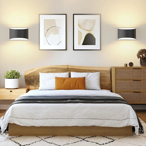 Straight Up Modern Matte Black LED Wall Sconces Set Of Two Hardwired Fixtures With 3000K Warm White Glow For Chill Living Vibes And Top Shelf Home Decor Pieces in a cozy bedroom setting.