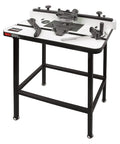 Rock Solid Free Standing Router Table With Heavy Duty Steel Base And Spacious 24 By 16 Inch Laminated Top Built Like A Tank For Precision Cabinet Work Featuring Smooth Aluminum Fence System from the side showing steel frame and tooling.