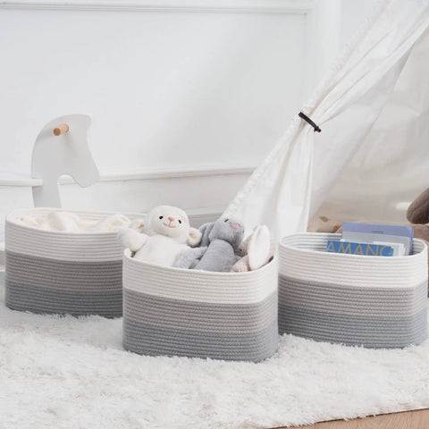 Woven Rope Storage Baskets Set Of 3 For Books Toys Towels And Magazines in a living room with plush toys and books