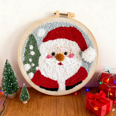 Beginner Punch Needle Kit Santa Claus With Hoop Craft Embroidery Set Easy For Adults And Kids Festival Gift And Home Decor Includes 20x20cm Embroidery Hoop Yarn Punch Needle Threader And Illustrated English Guide showing Santa design with Christmas decorations