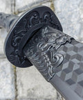 Close-up of dragon-tiger engraving on Two Pack Polypropylene Martial Swords For Practice And Training Katana Style Bokken blade.