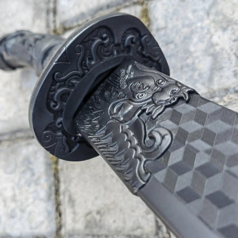 Close-up of dragon-tiger engraving on Two Pack Polypropylene Martial Swords For Practice And Training Katana Style Bokken blade.
