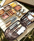 Waterproof Camp Kitchen Knife Bag with large capacity next to outdoor cooking utensils and food on a camp table