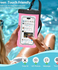 Waterproof Phone Pouch 2 Pack IPX8 Dry Bag Case Fits Any Phone Up To 8.4 Inches used by pool with hands, pink case.