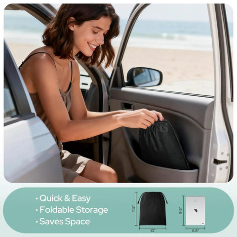 Woman storing Travel Blackout Curtain That Blocks Out One Hundred Percent Sun And UV Rays No Drill Window Cover With Stickers And Suction Cups Portable Light Blocking Shades For Bedroom Nursery Dorm RV 50 By 78 Inches in car door pocket at beach.