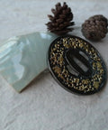 Close-up of alloy tsuba with black and gold morning glory pattern for Koshirae Style Samurai Sword With Alloy Tsuba 100 Black And Gold Morning Glor...