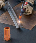 Premium Swirl Ring Consumables Kit For 220994 Plasma Cutter in use with retaining cap during metal cutting operation.