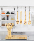 TV Show Themed Wooden Spoons Set With Holder, 6 Piece Kitchen Utensils for Cooking And Serving, displayed on a kitchen counter