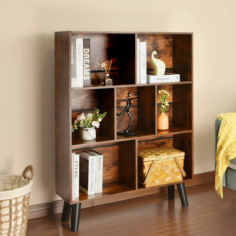 Three Tier Cube Bookshelf With Legs In Rustic Brown Mid Century Modern Style Dope Space Saving Open Bookcase With Retro Wood Look displayed in living room.