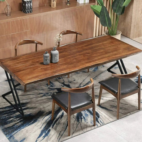 Dining room setup with wooden table and chairs, featuring Heavy Duty 28 Inch Metal Table Legs Set For DIY Furniture with modern design.