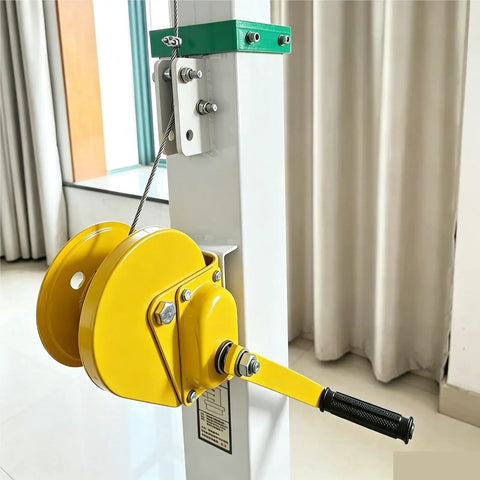 Close-up of the smooth hand crank mechanism on the Heavy Duty Aluminum Manual Telescopic Mast for camera support.